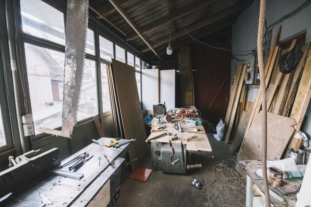 Workshop with tools and materials before clearing